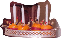 These miniature 1/12 scale Christingles were made for us by Sarah's sister, Catherine out of fimo with a real miniature candle in the middle.