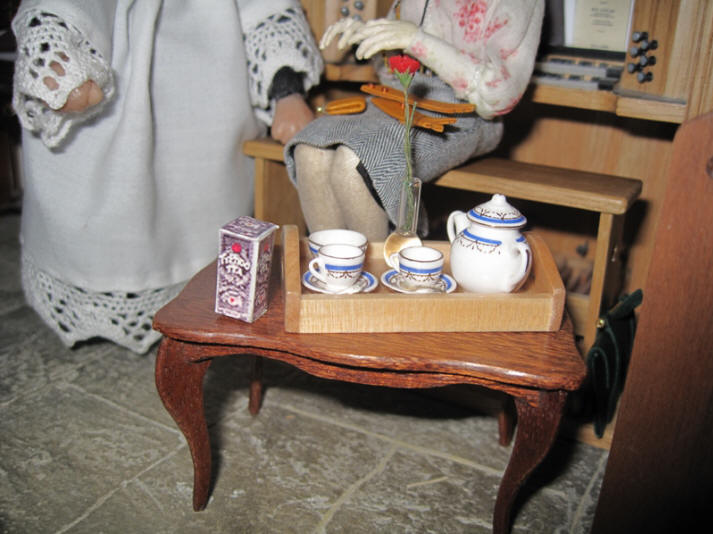 A close up of the bone china Blue Sovereign tea service